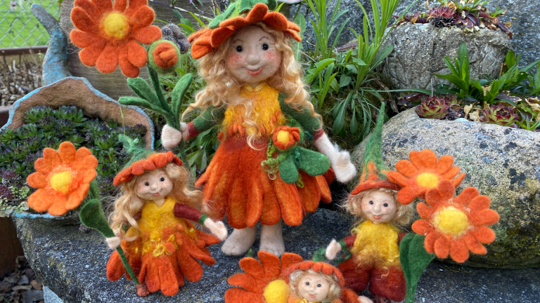 Blumenfrau mit Kind, Baby und Wiese